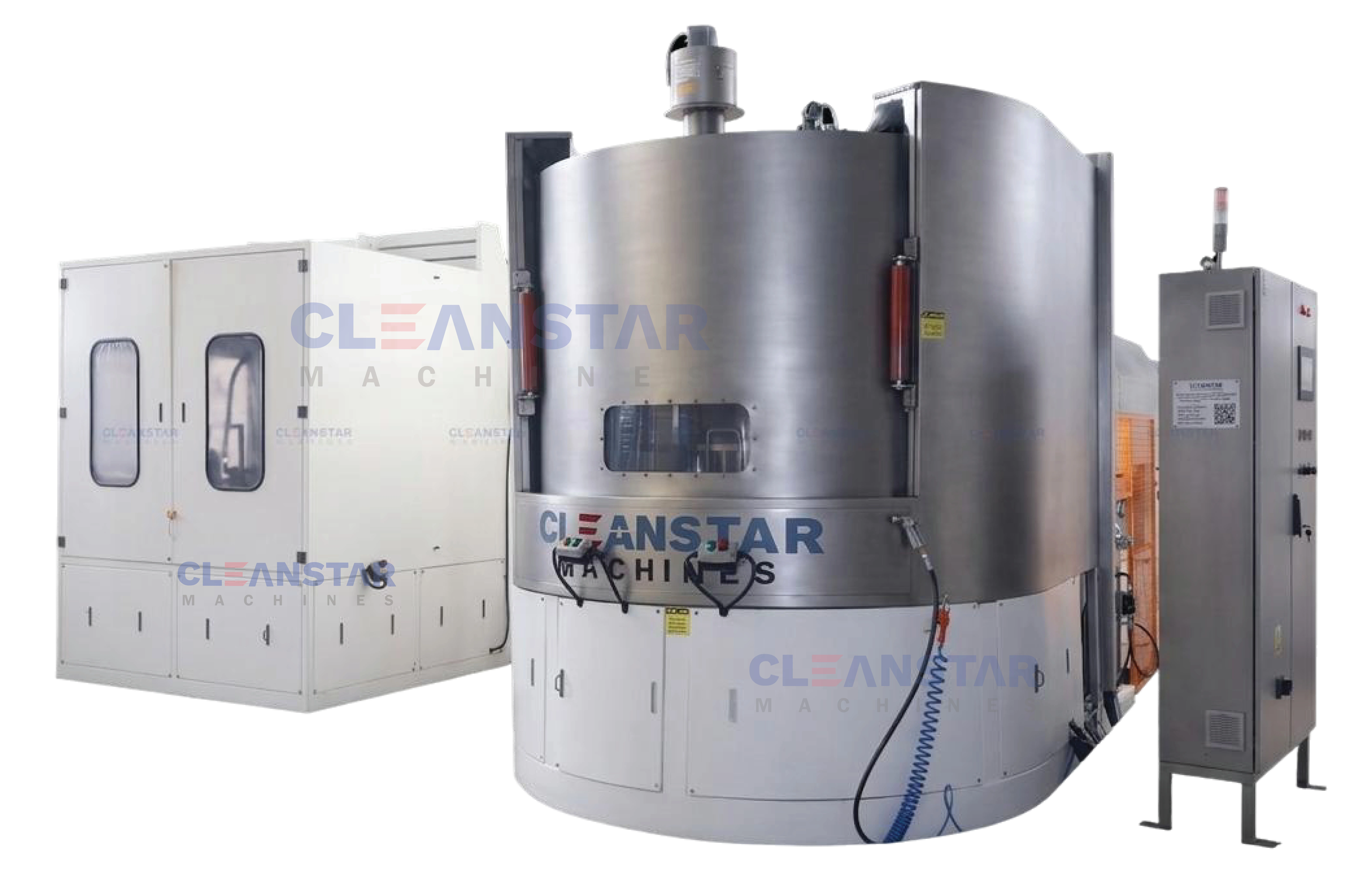 Top load parts washer cleaning industrial components inside stainless steel chamber.